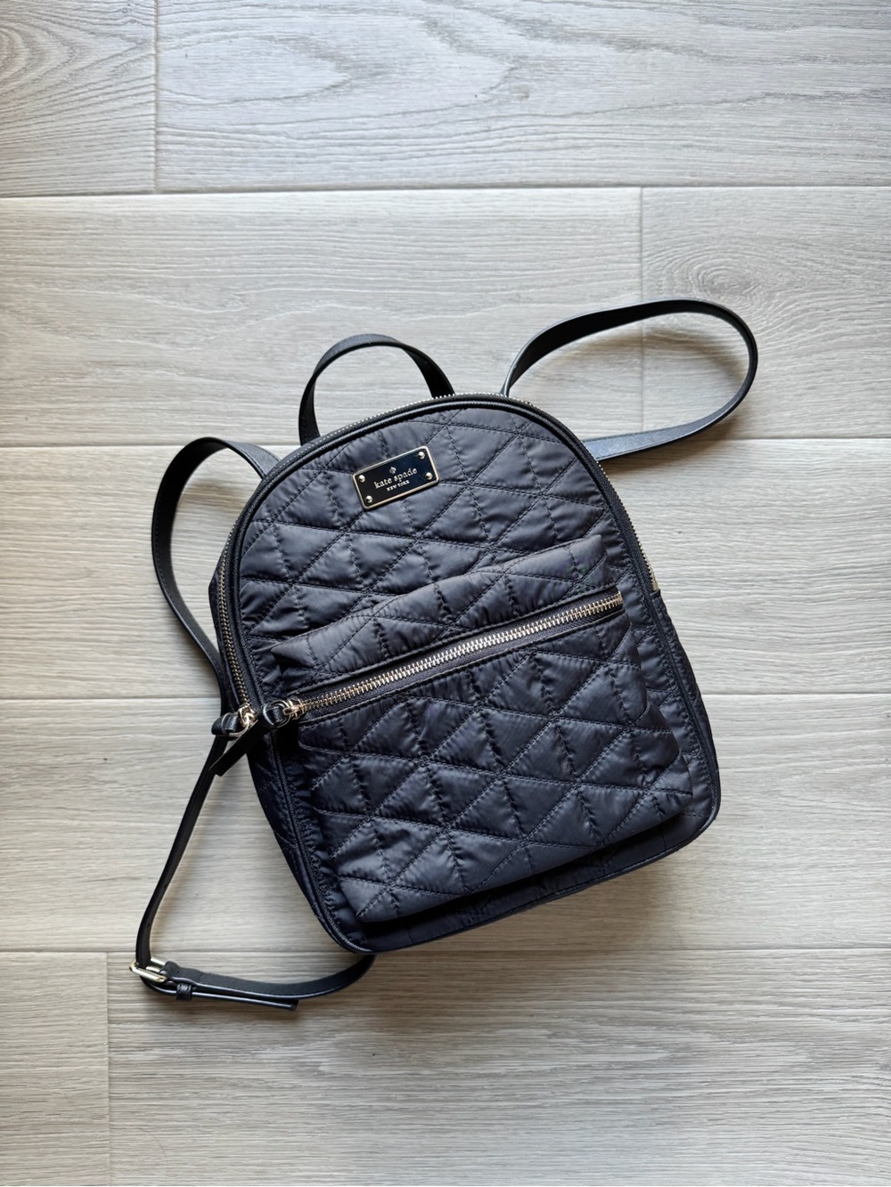 kate spade black quilted  backpack
